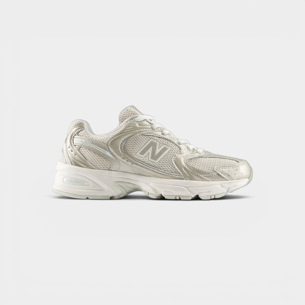 New Balance 530 Gold Metalic Linen